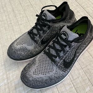 Women’s size 9.5 Nike Free RN FlYKNIT 2018 Re-issue.